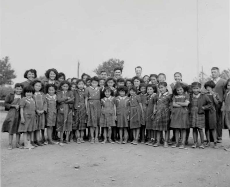 Group of students outside of building at Fort Vermilion St. Henri school 