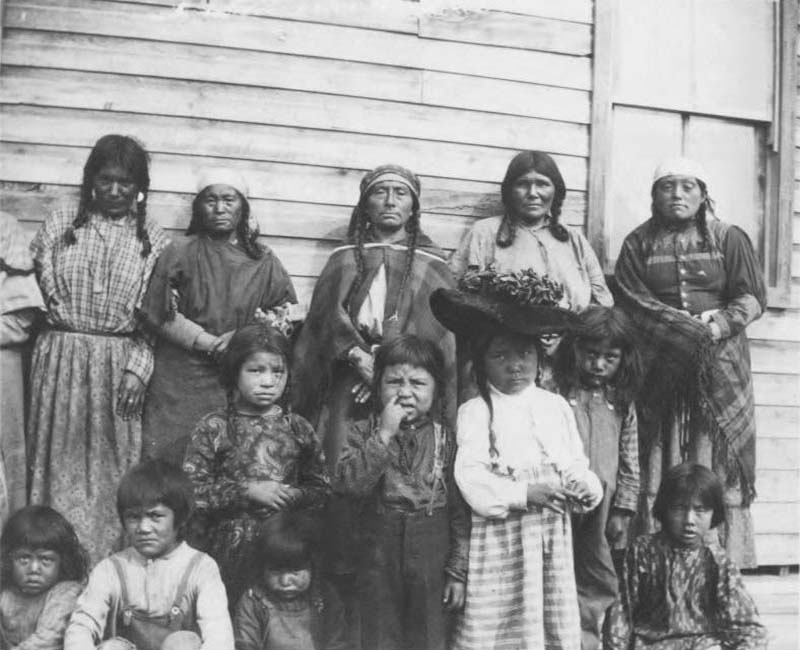 Group of people in front of building from Kamloops St. Louis School