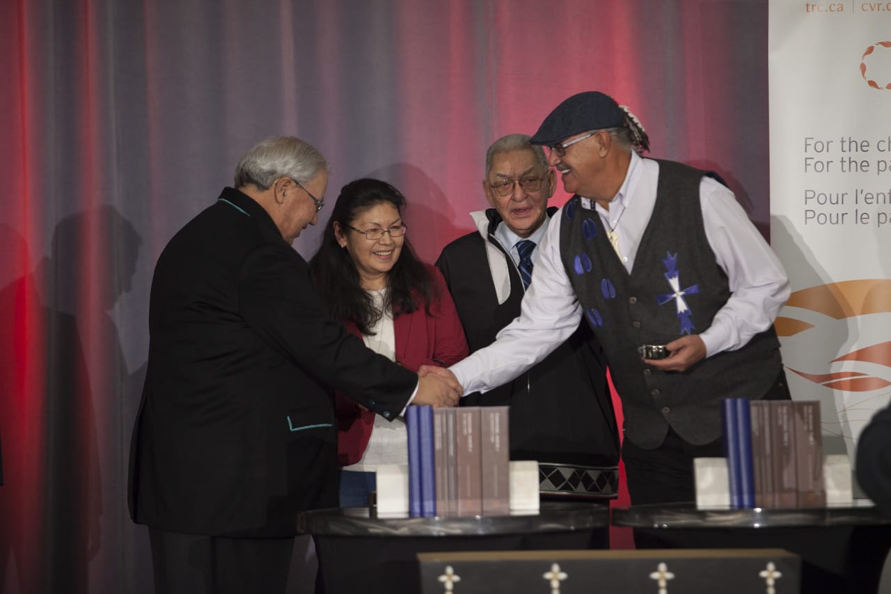 People standing on stage at TRC of Canada's Closing Ceremony