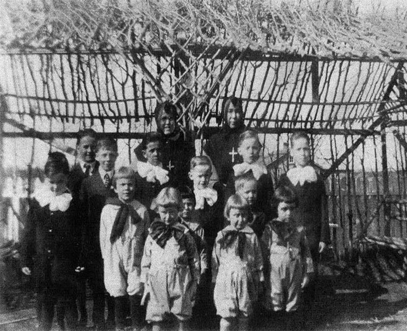 group of students and teachers outside at St. Albert school