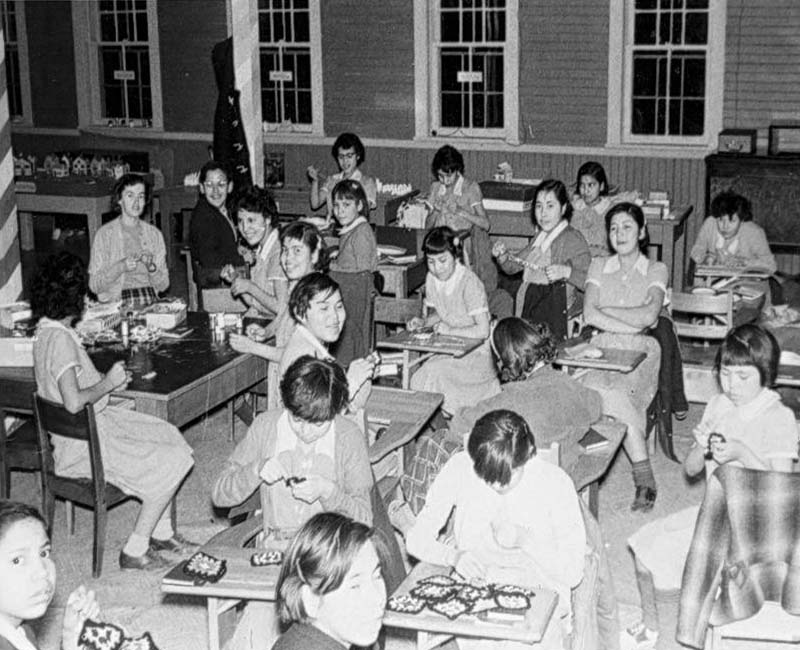 Students at desks in St. Georges school