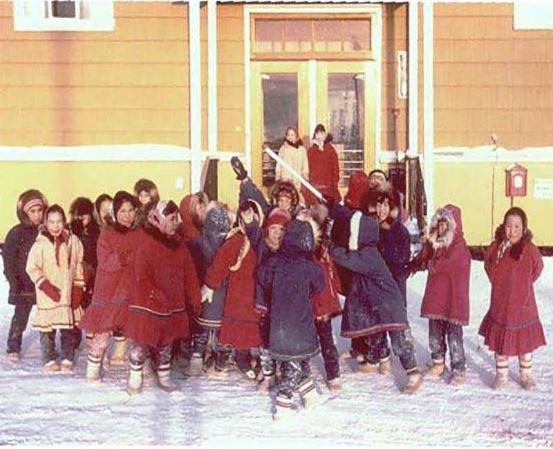 Group of students outside Stringer Hall Inuvik school