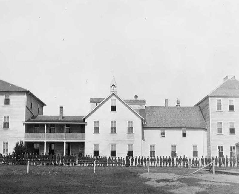 Group of students and teachers outside Thunderchild St. Henri building
