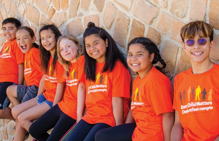 Children wearing Orange Every Child Matters shirt