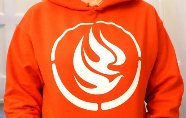 Product image of an orange hooded sweatshirt with the NCTR logo in white on the front.