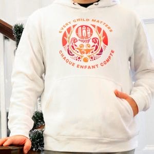 Product image of a white hooded sweatshirt with Survivors Flag and text "every child matters" and "chaque enfant compte"