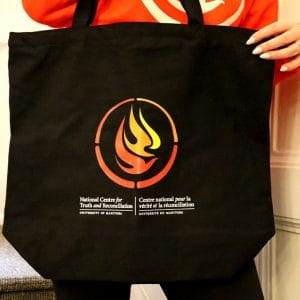 Product image of a black tote with NCTR logo on the side.